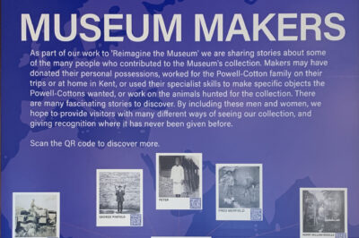 Museum display panel entitled 'Museum Makers' it shows a photograph of Percy Powell-Cotton in the centre surrounded by 12 photographs of individuals who contributed to the collections