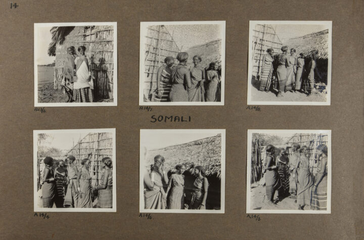 photograph album page with six black and white snapshots of women with the caption 'Somali'
